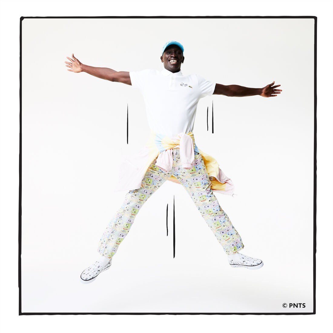 قميص بولو من القطن العضوي الرجالي من مجموعة Lacoste x Peanuts قميص بولو من القطن العضوي الرجالي من مجموعة Lacoste x Peanuts