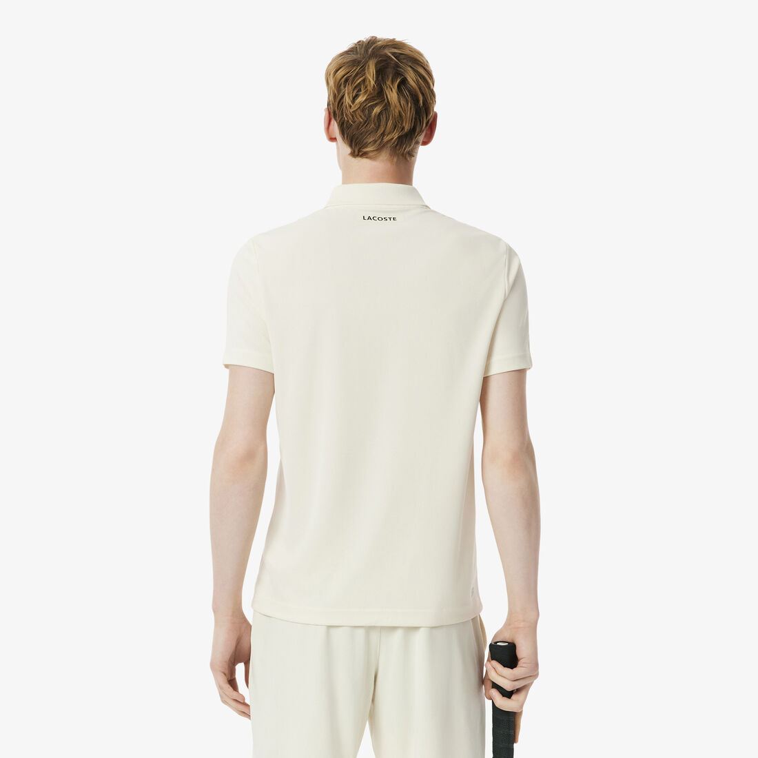 قميص بولو تنس بقصّة ضيقة مطبوع وجاف للغاية قميص بولو تنس بقصّة ضيقة مطبوع وجاف للغاية