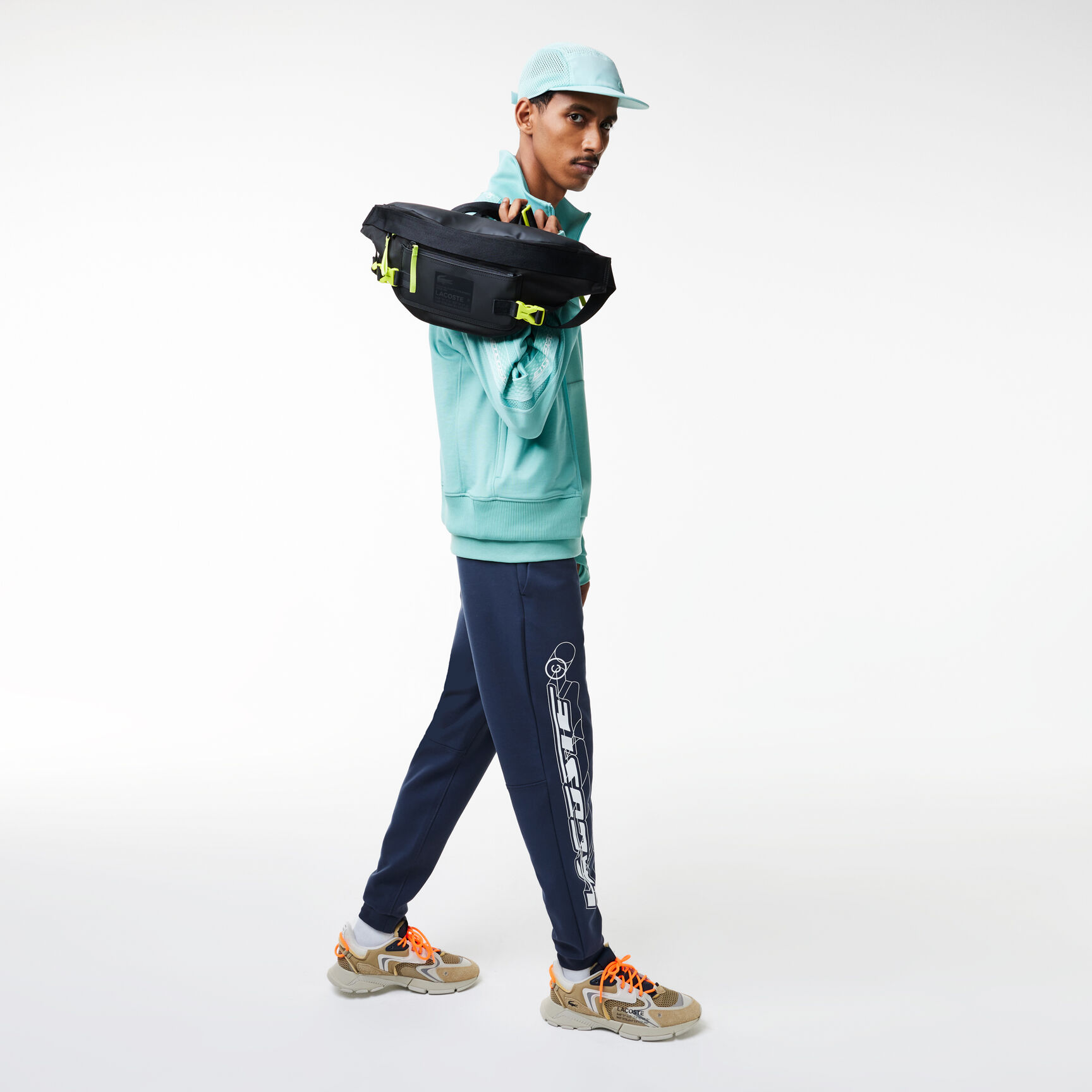 حقيبة خصر لاكوست بتصميم مقاوم لزخات الماء للرجال