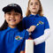 lacoste kids  holiday badge organic cotton piqu  polo