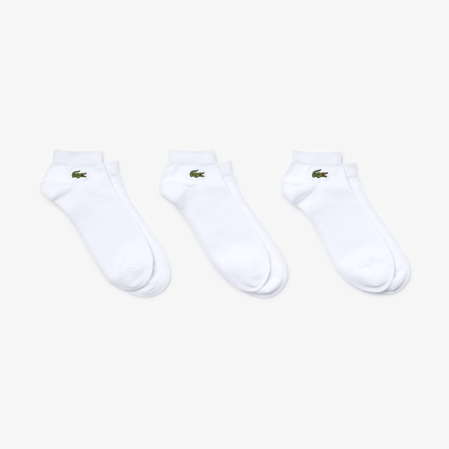 ثلاثة أزواج من جوارب Lacoste القصيرة المحيكة من الجيرسيه للرجال ثلاثة أزواج من جوارب Lacoste القصيرة المحيكة من الجيرسيه للرجال