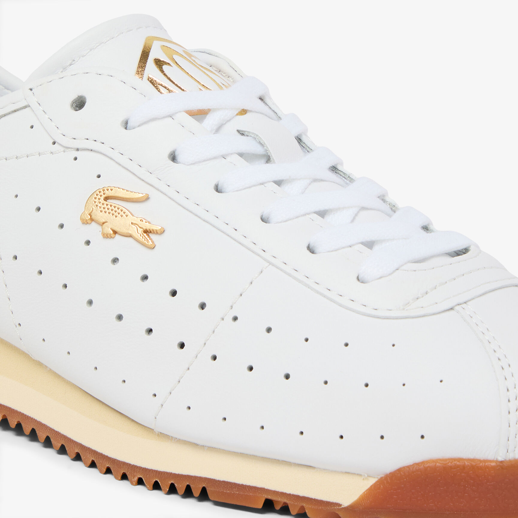 حذاء رياضي نسائي منخفض من الجلد حذاء رياضي نسائي منخفض من الجلد