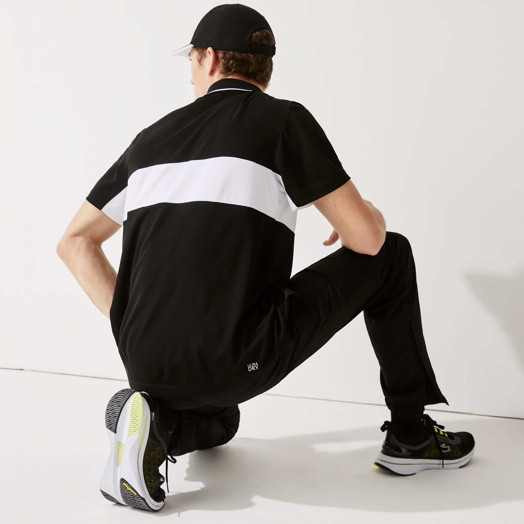 قميص بولو مقاوم مسامي للرجال مع كتل لونية مجموعة Lacoste SPORT