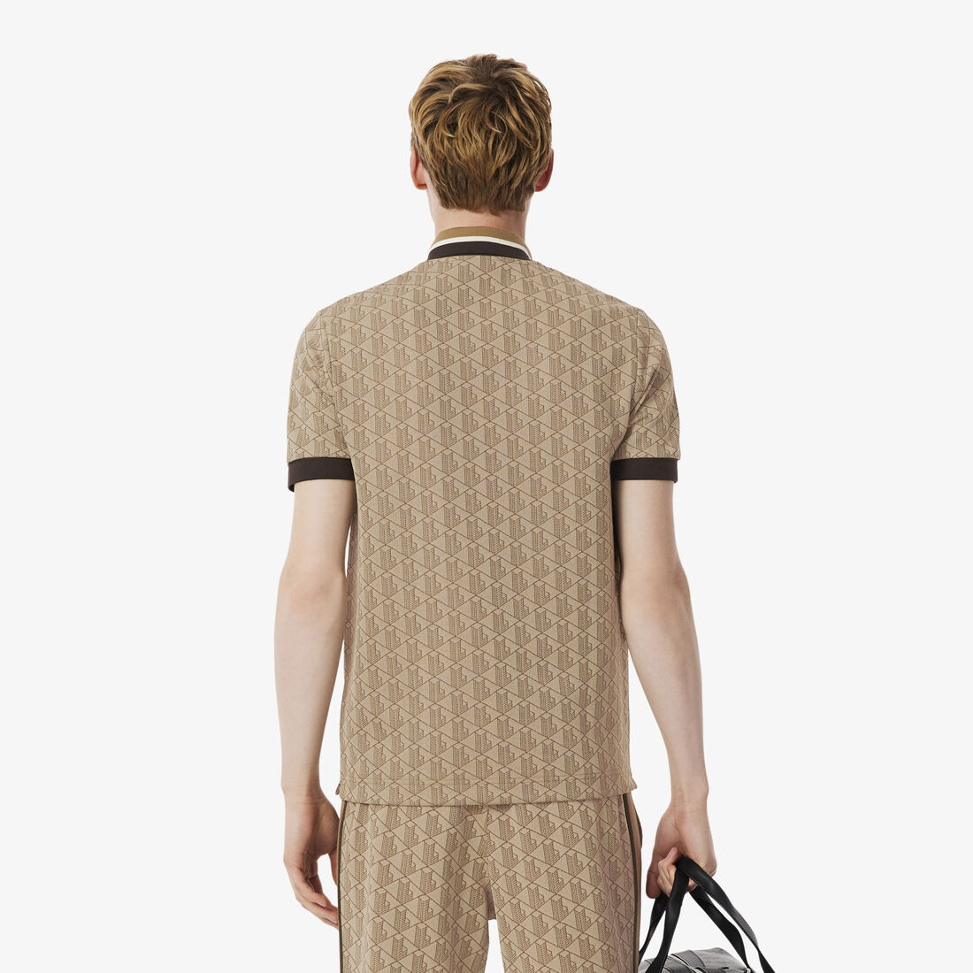 قميص بولو كلاسيكي بقصّة كلاسيكية من قماش الجاكار أحادي اللون قميص بولو كلاسيكي بقصّة كلاسيكية من قماش الجاكار أحادي اللون