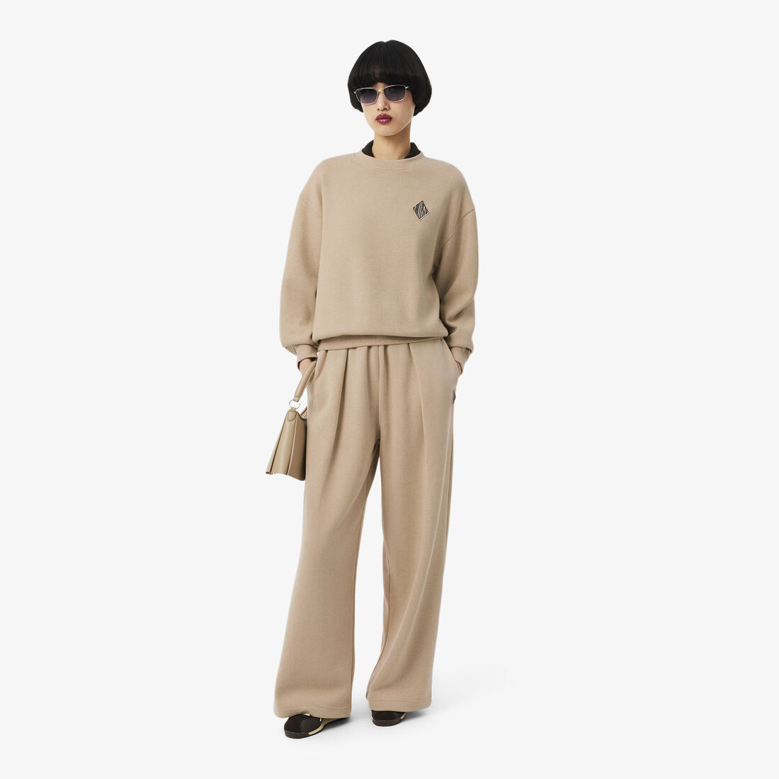 قميص رياضي واسع من قماش إنترلوك قميص رياضي واسع من قماش إنترلوك