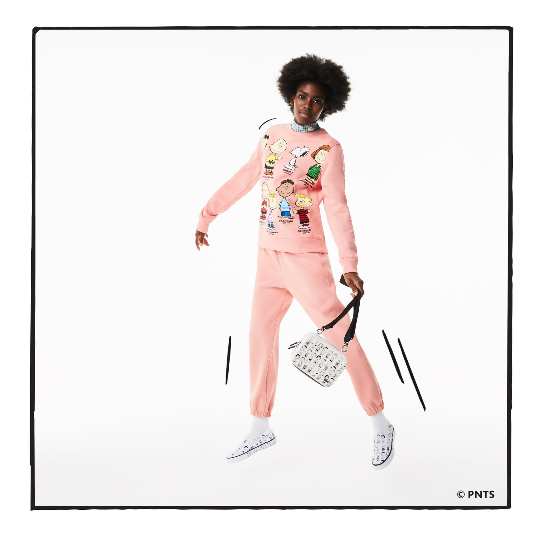 حقيبة كتف نسائية جلدية بطبعة Peanuts من مجموعة Lacoste x Peanuts