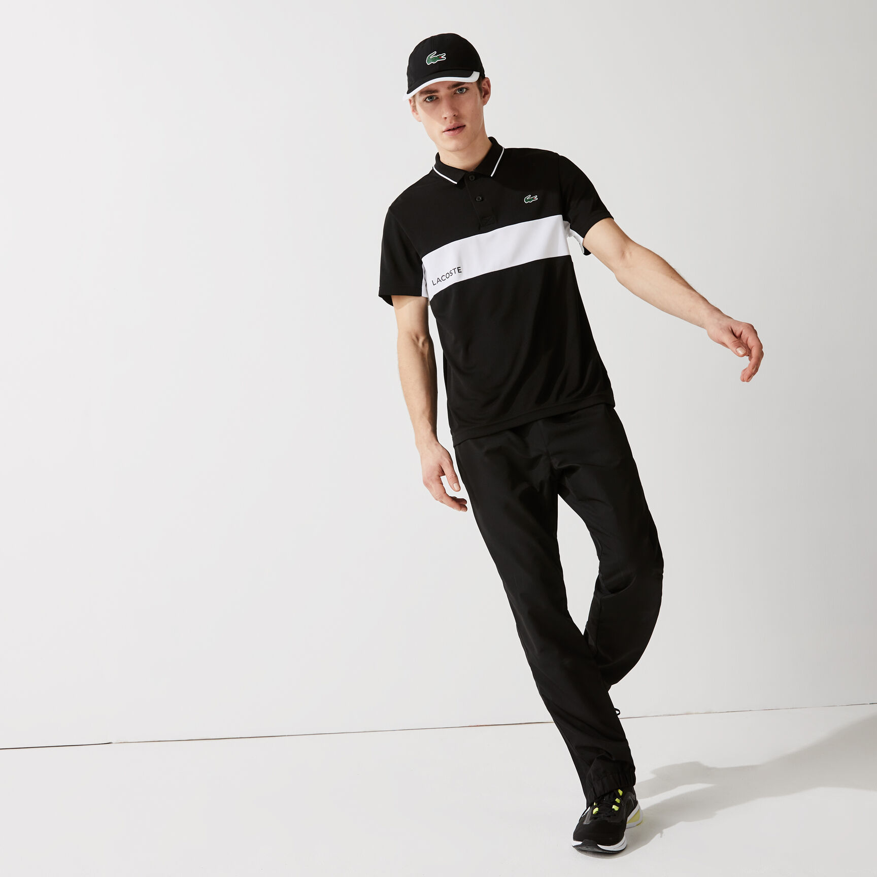 قميص بولو مقاوم مسامي للرجال مع كتل لونية مجموعة Lacoste SPORT