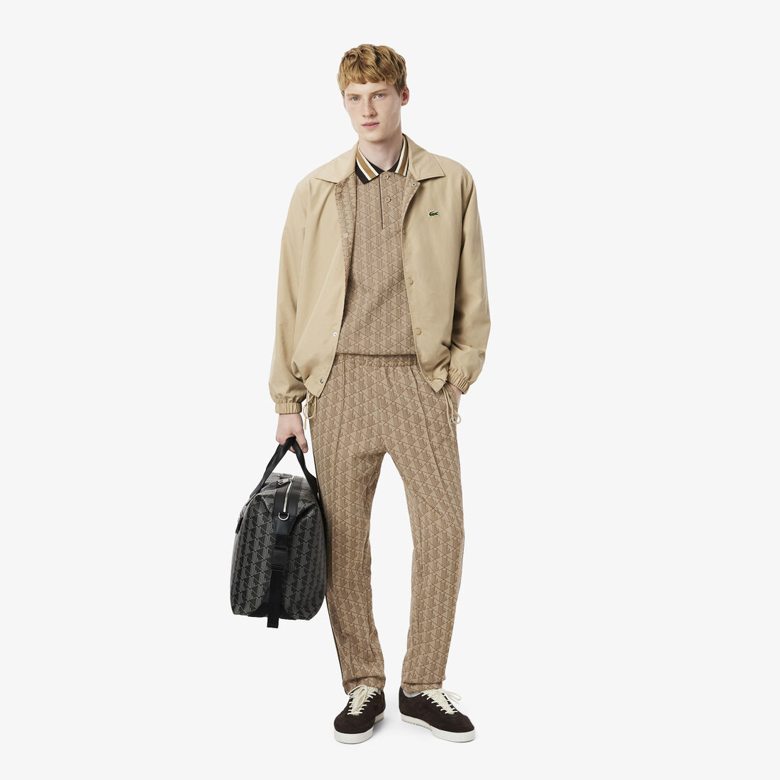 قميص بولو كلاسيكي بقصّة كلاسيكية من قماش الجاكار أحادي اللون قميص بولو كلاسيكي بقصّة كلاسيكية من قماش الجاكار أحادي اللون