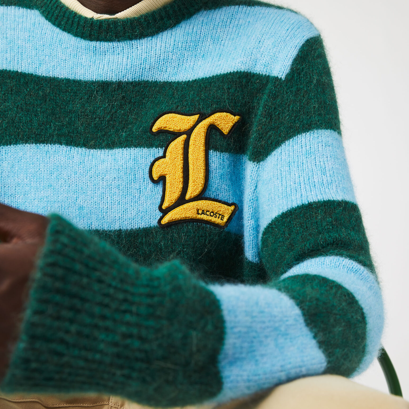 سترة من مزيج الصوف المخططة للجنسين من مجموعة Lacoste L!VE سترة من مزيج الصوف المخططة للجنسين من مجموعة Lacoste L!VE