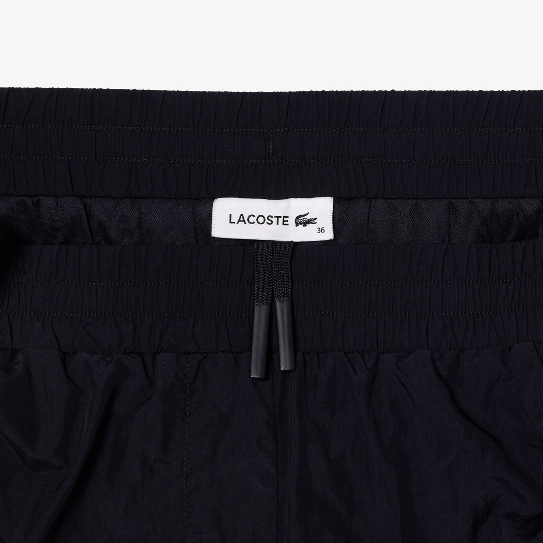 بنطال رياضي مبطن بنقشة شعار الماركة بنطال رياضي مبطن بنقشة شعار الماركة