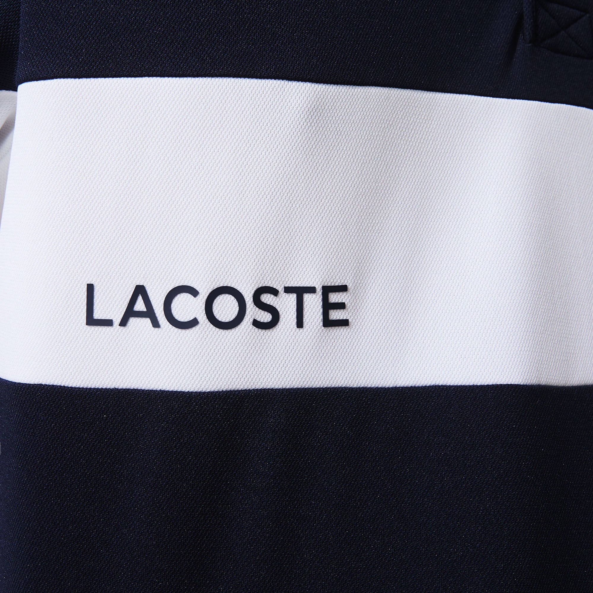 قميص بولو مقاوم مسامي للرجال مع كتل لونية مجموعة Lacoste SPORT