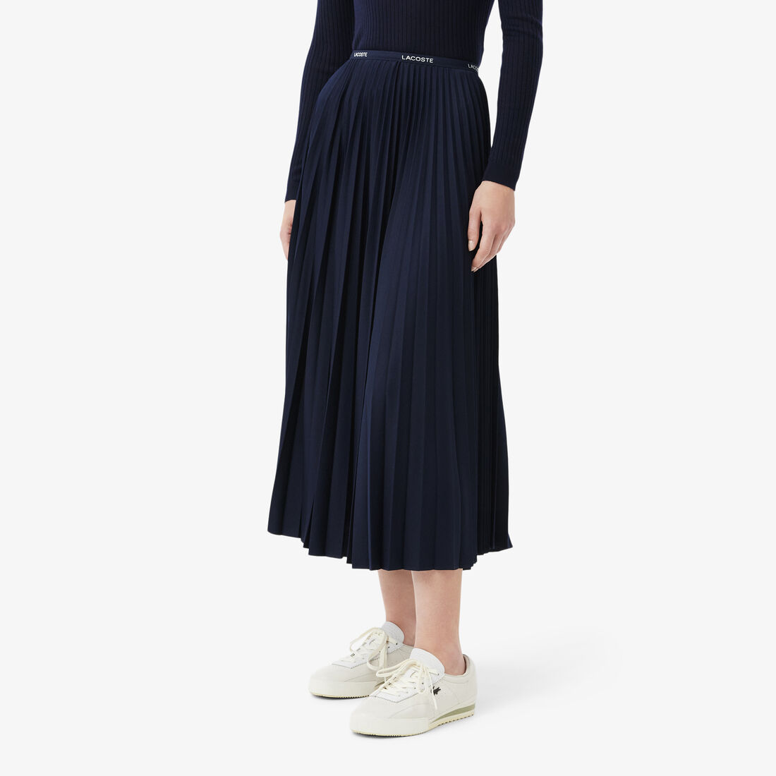 تنورة طويلة مطوية بخصر مطاطي تنورة طويلة مطوية بخصر مطاطي