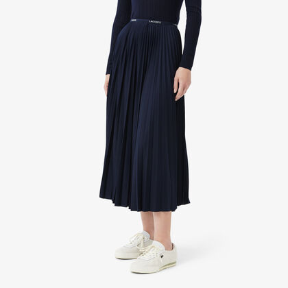 تنورة طويلة مطوية بخصر مطاطي تنورة طويلة مطوية بخصر مطاطي