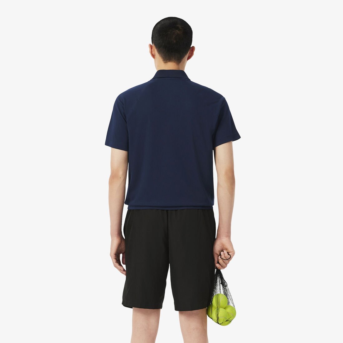 قميص بولو بقصّة عادية واقٍ من الأشعة فوق البنفسجية قميص بولو بقصّة عادية واقٍ من الأشعة فوق البنفسجية