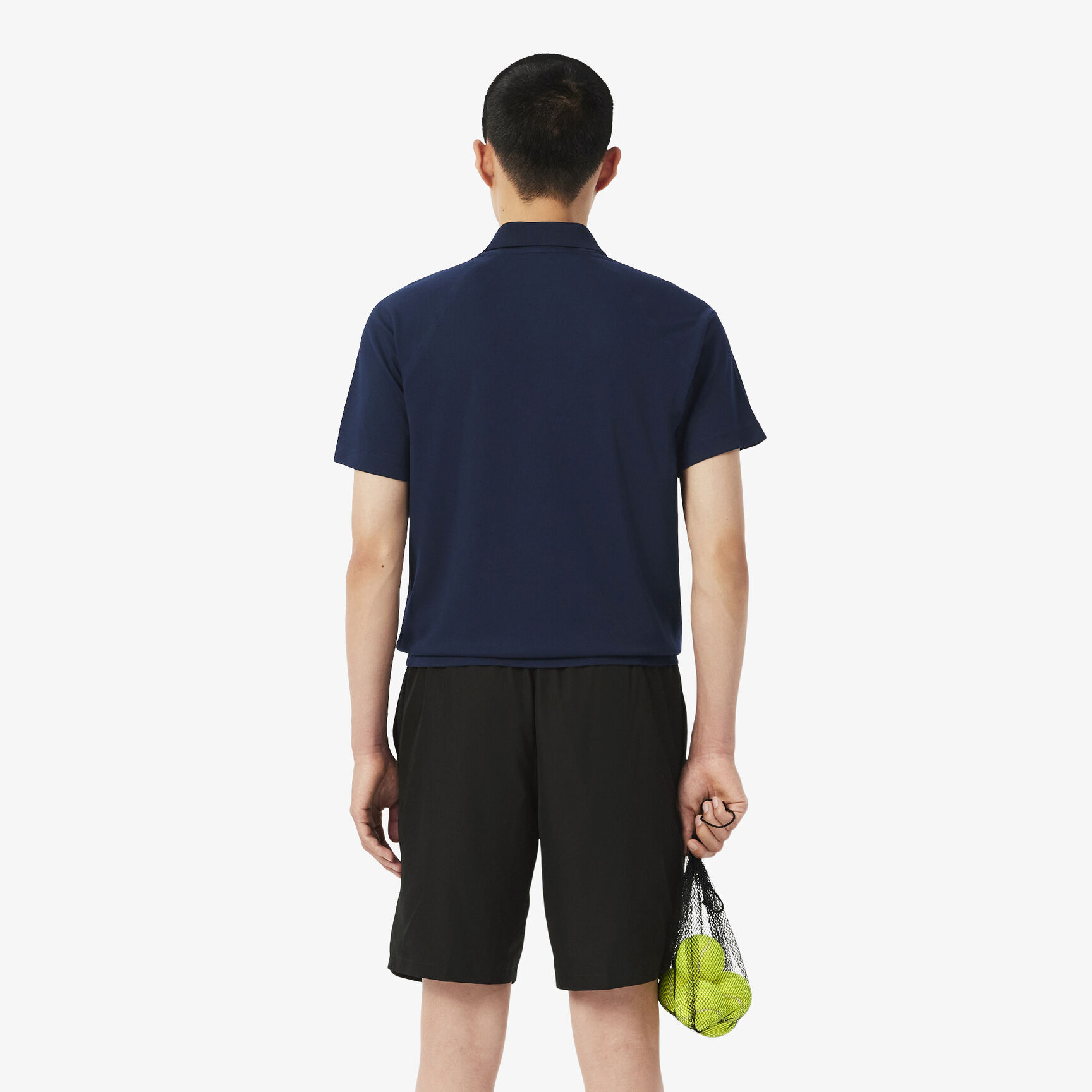 قميص بولو بقصّة عادية واقٍ من الأشعة فوق البنفسجية قميص بولو بقصّة عادية واقٍ من الأشعة فوق البنفسجية